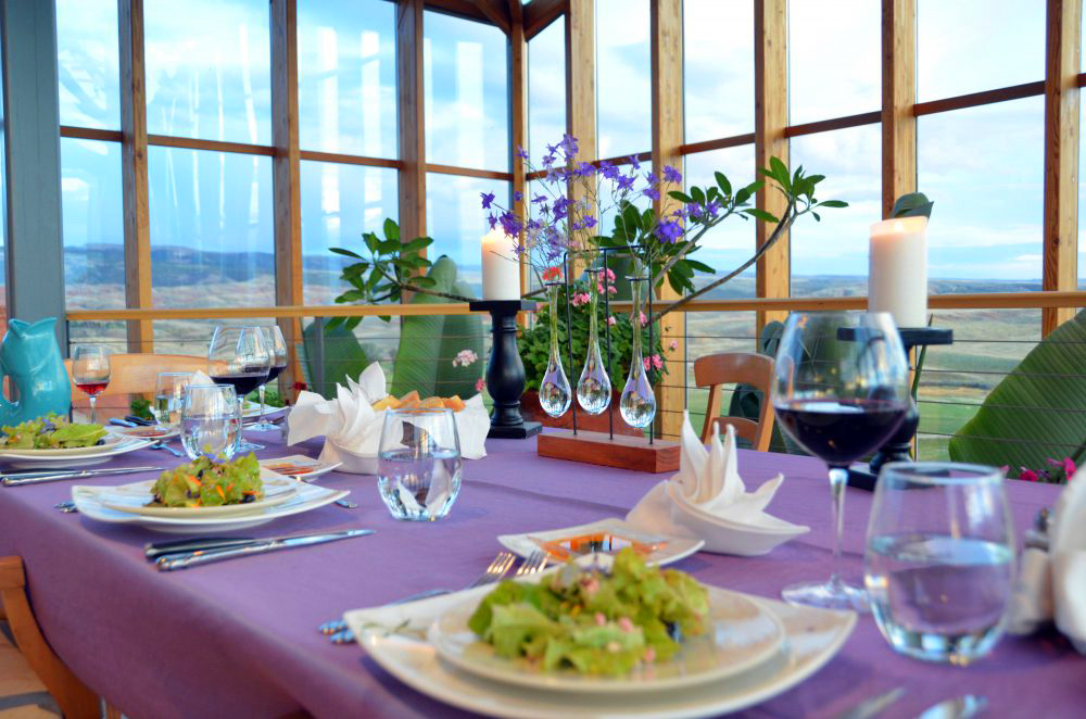 An extensive wine cellar, fine cuisine, and panoramic views make for memorable meals at Red Reflet Guest Ranch. Photo courtesy Red Reflet.