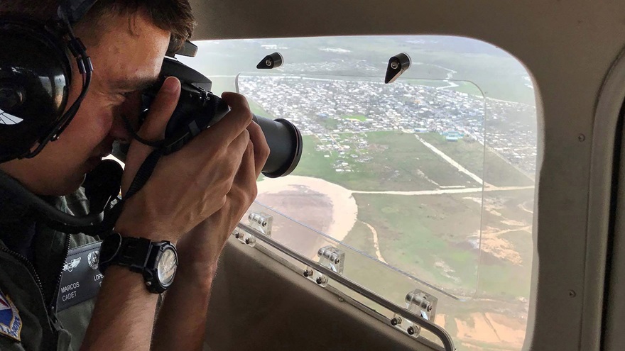 Cadet Lt. Col. Marcos Lopez of the Puerto Rico Wing focuses on aerial imagery of the hurricane-spawned devastation below. Photo courtesy of the Civil Air Patrol.