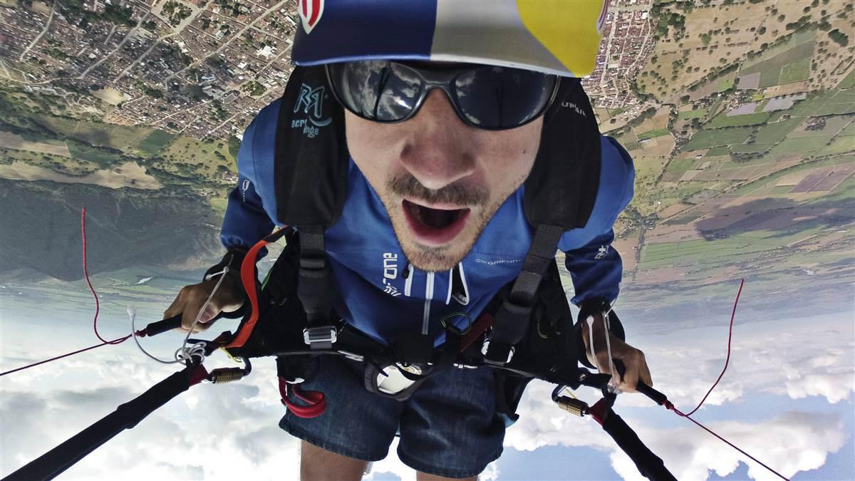 Horacio Llorens performs during the Paragliding World Cup Superfinal over the valley of Roldanillo, Colombia, in 2013. Photo by Camilo Rozo/Red Bull Content Pool.