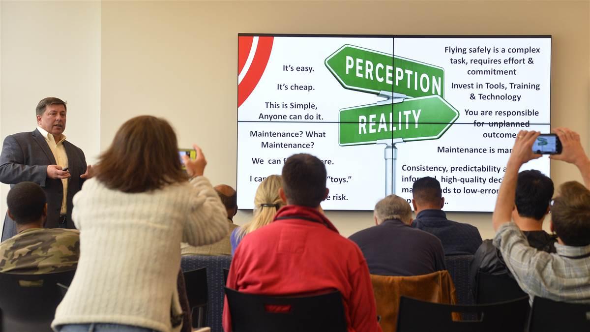 Drone Journalism School faculty Greg Agvent, the director of CNN Aerial Imagery & Reporting, leads a discussion on drone technology during a workshop for journalists learning about FAA Part 107 criteria. Photo by David Tulis.                                                                              