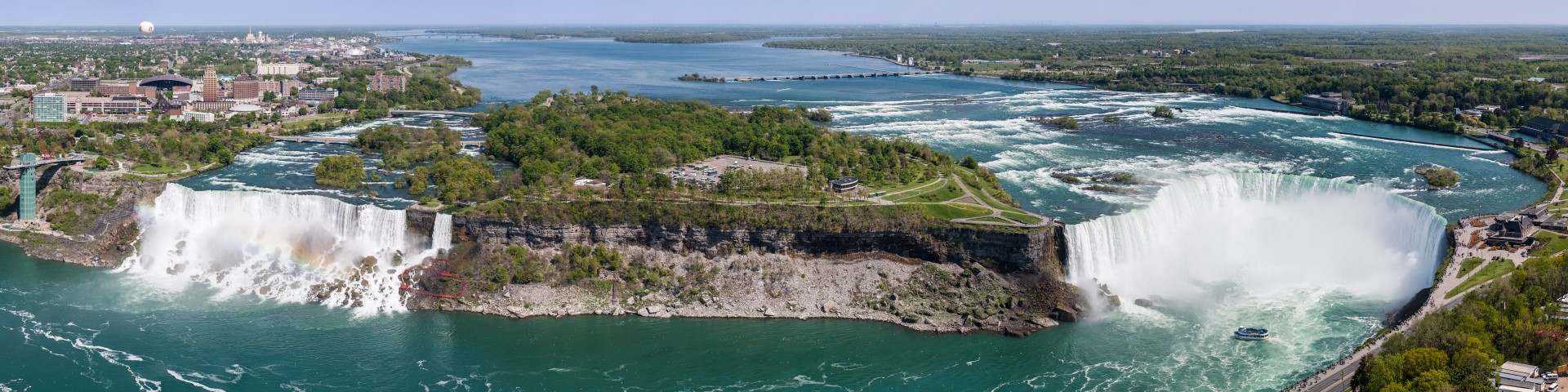 Niagara Falls. Left to right: American Falls, the smaller Bridal Veil Falls, and Horseshoe Falls, which straddles the U.S./Canada border. Photo by Robert F. Tobler via Wikipedia.