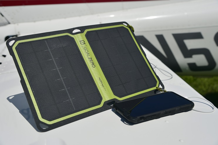 The rugged and convenient Nomad 7 Plus solar panel by Goal Zero was a useful pilot accessory during Hurricane Irma. If pointed in the correct direction under strong sunlight, portable electronic devices were trickle-charged by the sun’s energy. Photo by David Tulis.