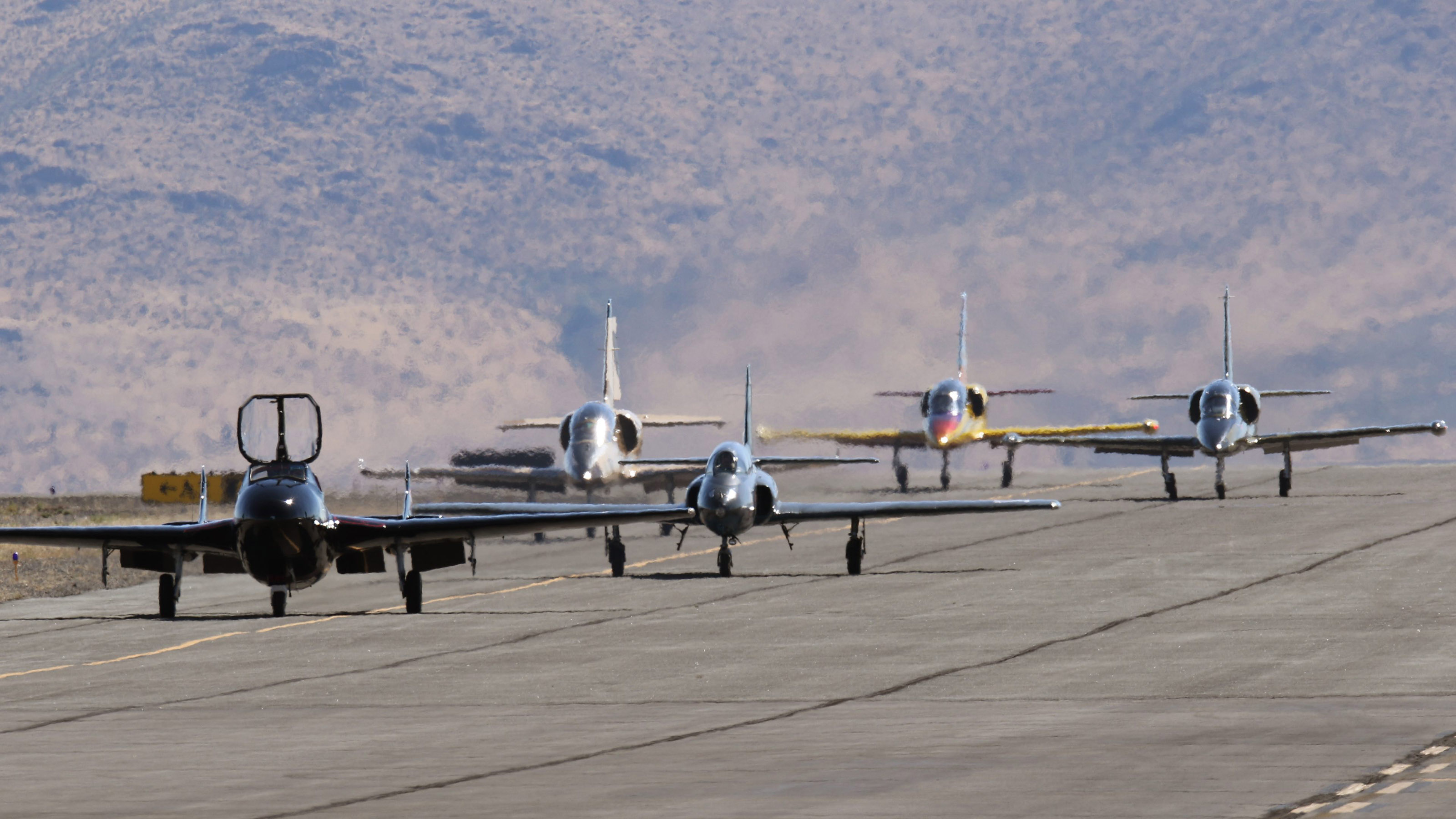 Racers in the Jet Class taxi for a practice heat during the 2017 National Championship Air Races in Reno. Photo by Robert Fisher.