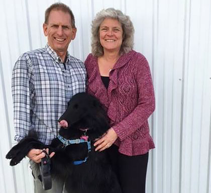 Shawn and Nadine Kelley with their dog Kayla. Photo courtesy of Nadine Kelley.