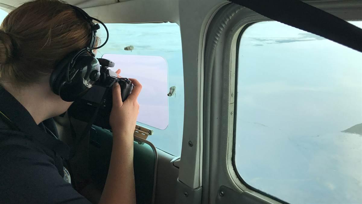 Civil Air Patrol Maj. Natalie Franc makes an aerial photo above the Brazos River in Houston, during a Hurricane Harvey assessment mission. Photo courtesy of Lt. Col. Ronald F. Diana, Civil Air Patrol.