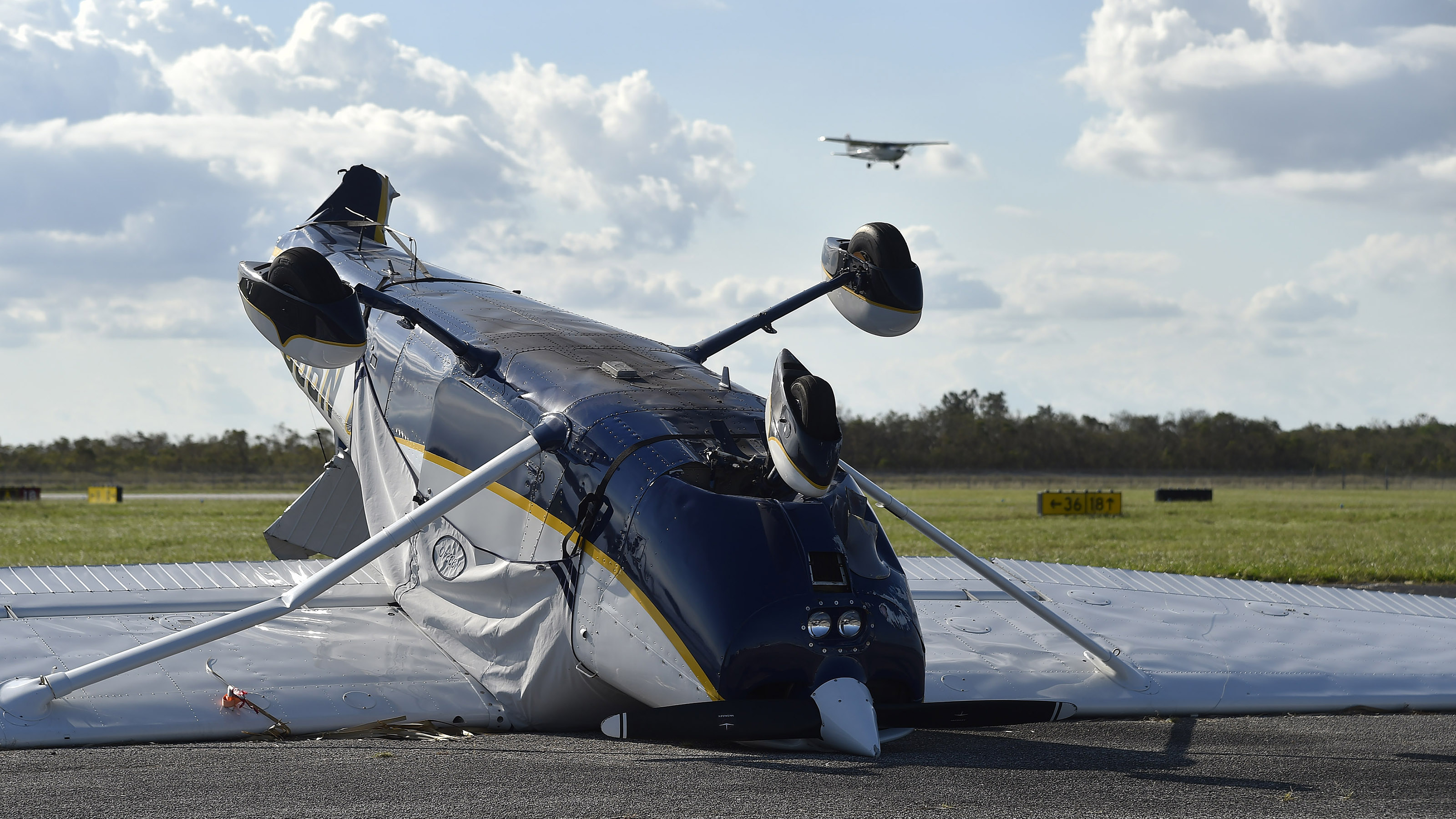 A Cessna at Miami Homestead General Airport is left upended in the wake of Hurricane Irma Sept. 15. Photo by David Tulis.