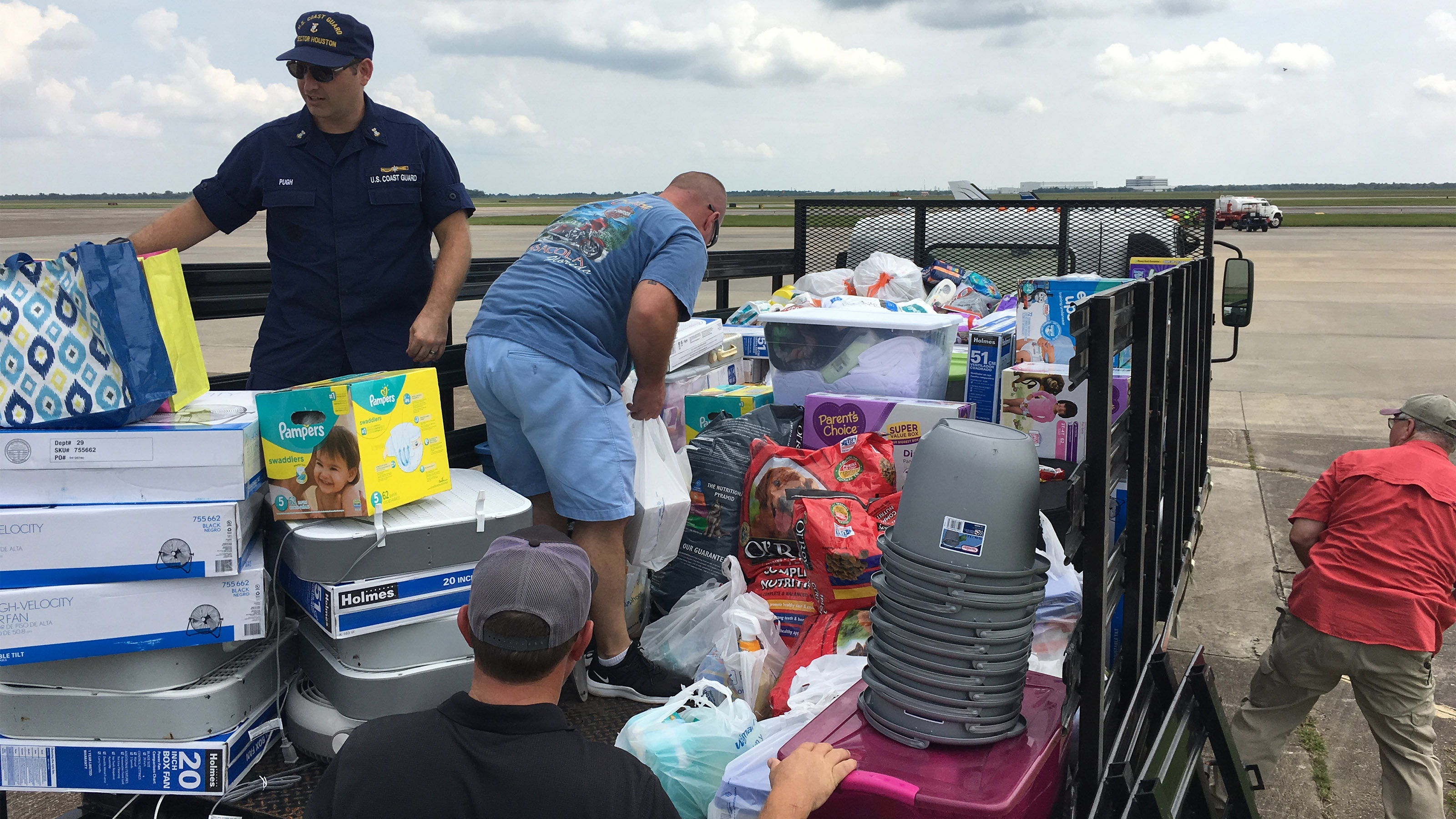 Distributing supplies at Ellington Airport (KEFD) to directly support U.S. Coast Guard families displaced by Hurricane Harvey.  Photo courtesy of Robert Johnson.