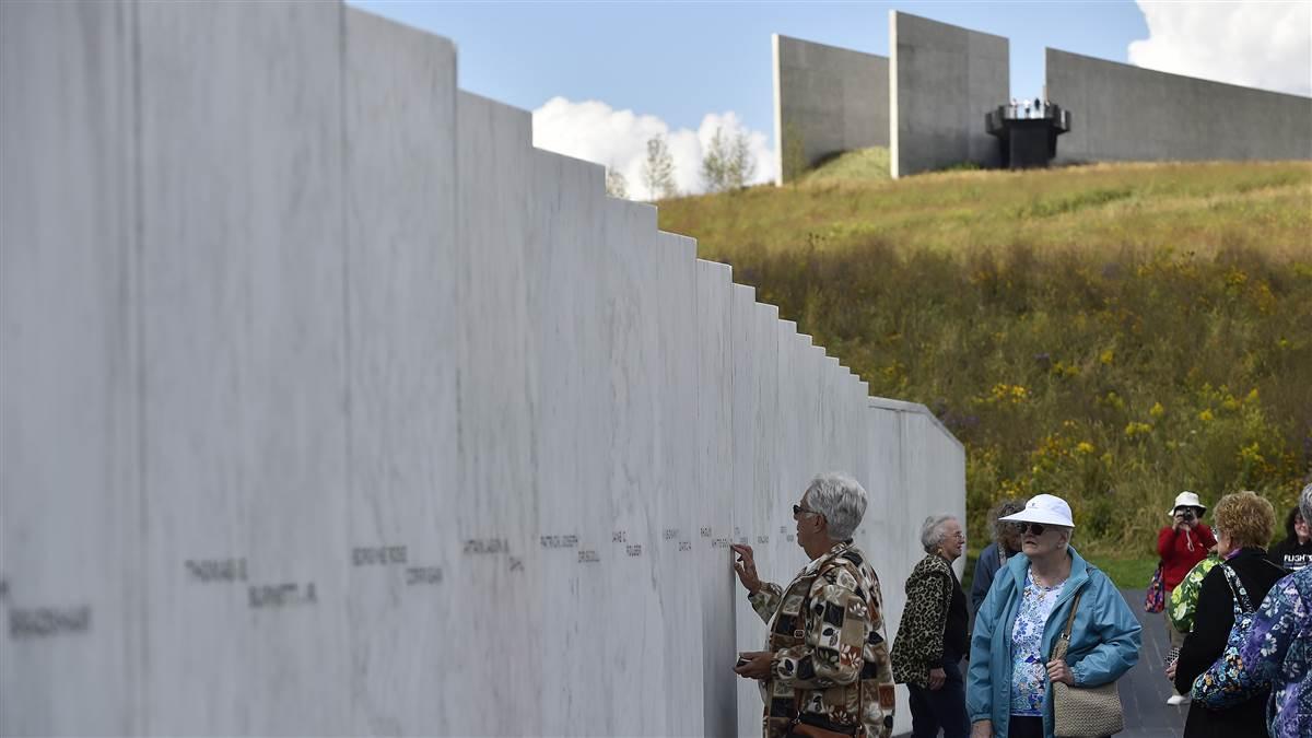 People visit the Wall of Names at the Flight 93 National Memorial near Shanksville, Pennsylvania, which honors the 40 passengers and crew aboard a United Airlines jetliner that was hijacked by terrorists Sept. 11, 2001. Photo by David Tulis.