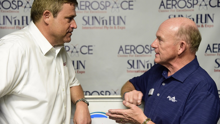 Piper Aircraft CEO Simon Caldecott and ATP Director of Admissions Eric Priester announce a deal for 100 Piper Archer TX aircraft during the Sun n Fun International Fly-In and Expo in Lakeland, Florida, Tuesday, April 10, 2018. Photo by David Tulis.