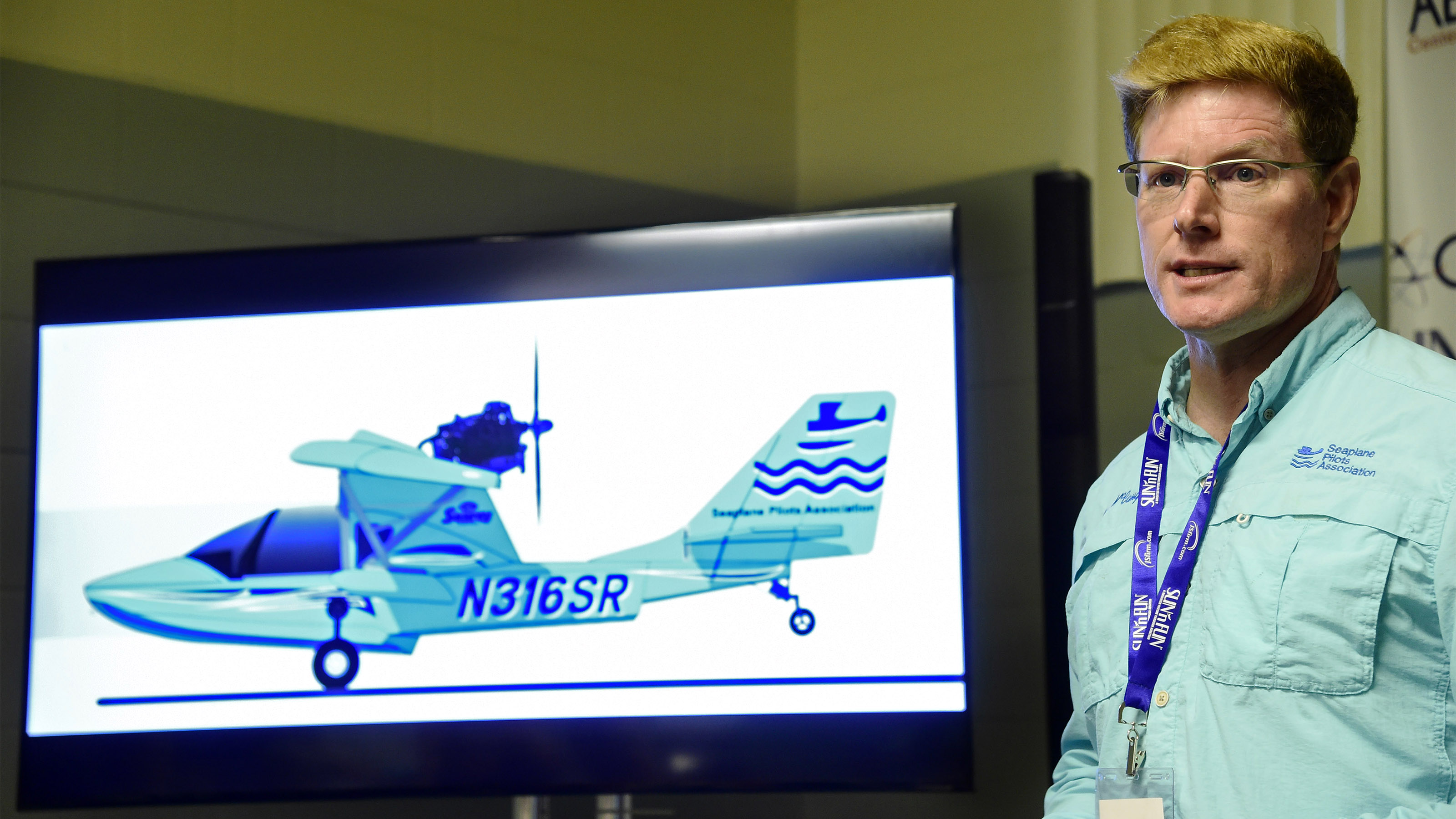 Seaplane Pilot Association Executive Director Steven McCaughey announces the donation of a Searey amphibious light sport aircraft that will be deployed for outreach during the Sun n Fun International Fly-In and Expo in Lakeland, Florida, Tuesday, April 10, 2018. Photo by David Tulis.