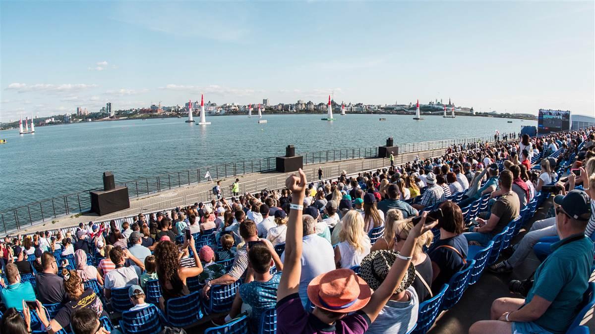 The crowd watches Juan Velarde of Spain fly during the Red Bull Air Race World Championship race in Kazan, Russia, on Aug. 26. Photo by Dmitriy Tibekin/Red Bull Content Pool.