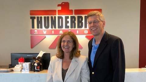 Rep. Erik Paulsen (R-Minn.) and Thunderbird Aviation Inc. President Nancy Grazzini Olson at Flying Cloud Airport in Minnesota.