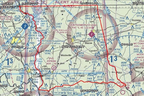 Montgomery County, North Carolina, is outlined in red and the alert area is depicted by magenta dashes.