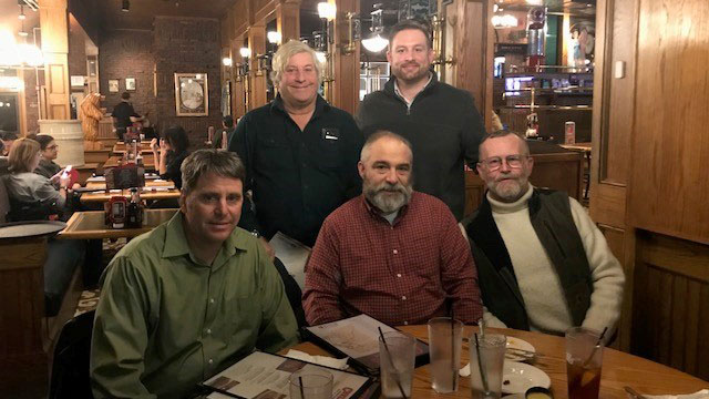 AOPA Eastern Regional Manager Sean Collins (standing, right) joined Rhode Island Airport Support Network volunteers Bill Weedon (Quonset State Airport) Henry Dupont (Block Island State Airport) Dean Morrone (Westerly State Airport), and Graeme Smith (Newport State Airport) to discuss issues facing Rhode Island airports.