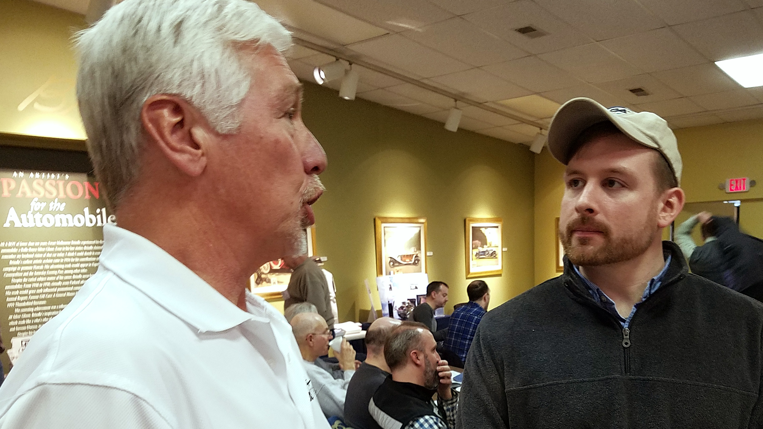 Paul Richards of Atol Avion discusses his company’s plans with AOPA Eastern Regional Manager Sean Collins. Photo by Dan Namowitz.