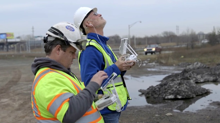 Engineer Bill Mitchell, left, operated the camera while George Finlay focused on flying during the high mast light pole inspections along New Jersey highways. Photo courtesy of George Finlay/Principia. 