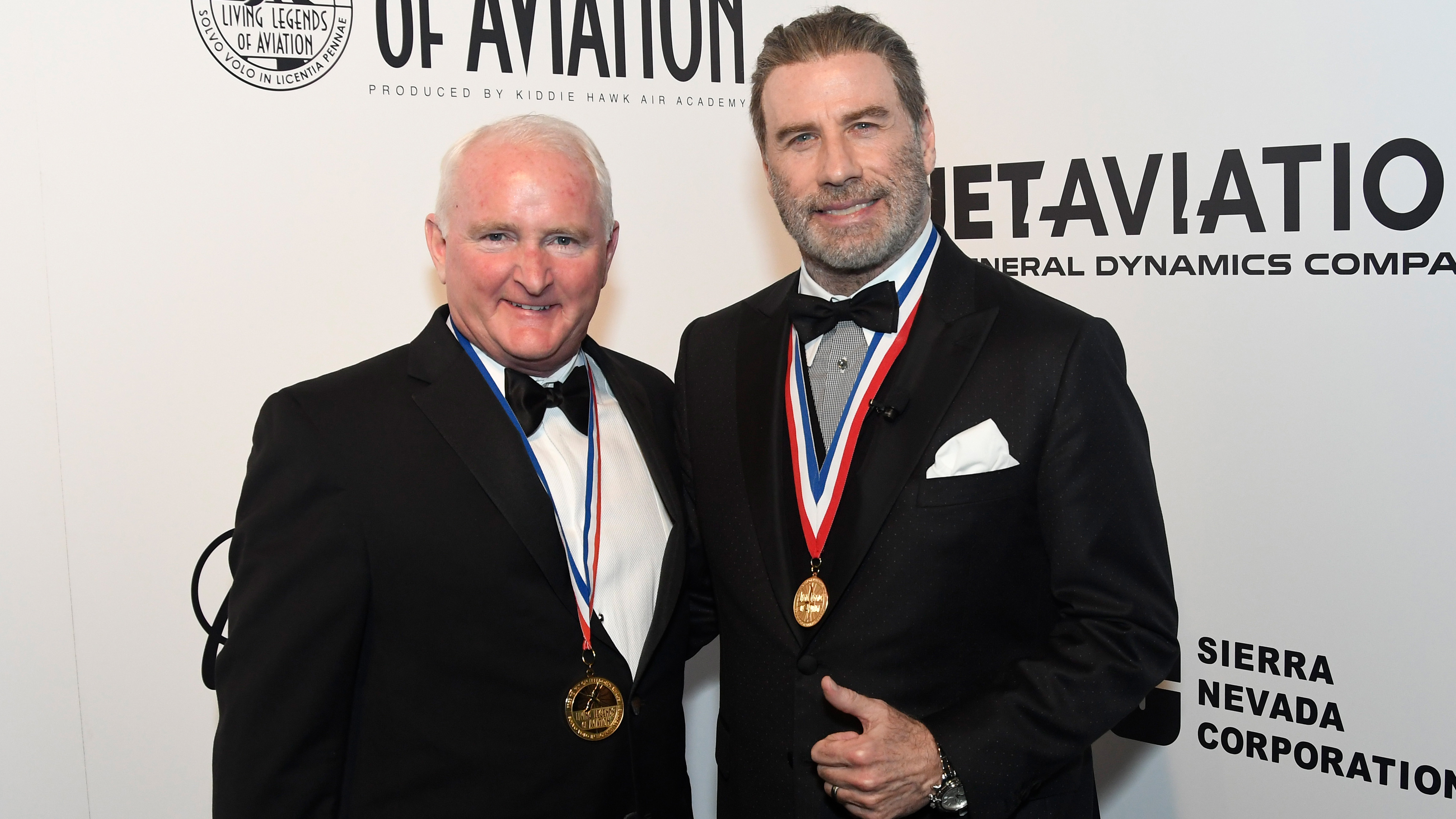 AOPA President Mark Baker with actor and pilot John Travolta at the fifteenth annual Awards for the Living Legends of Aviation on Jan. 19 in Beverly Hills, California. Photo Credits ©2018 Larry Grace Photography / Living Legends of Aviation.