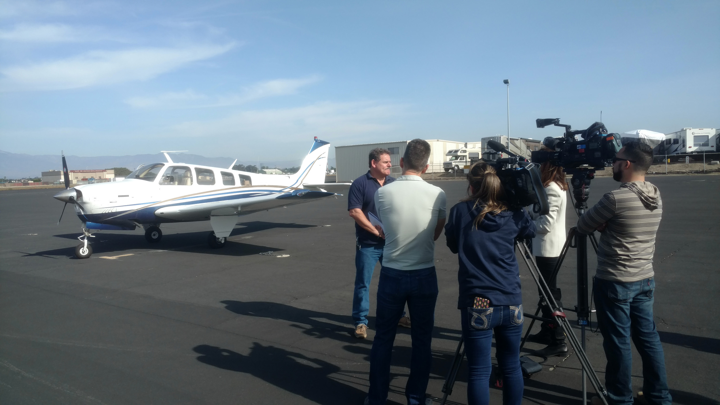 Volunteer pilot Jeff Moorhouse is interviewed by local media Jan. 15. Photo courtesy of Emily Barany. 