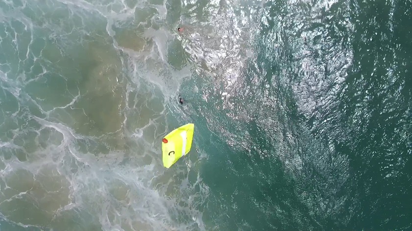 A floatation device falls away from the Westpac Little Ripper to assist two swimmers in distress in Australia on Jan. 18. Photo courtesy of Westpac Little Ripper. 