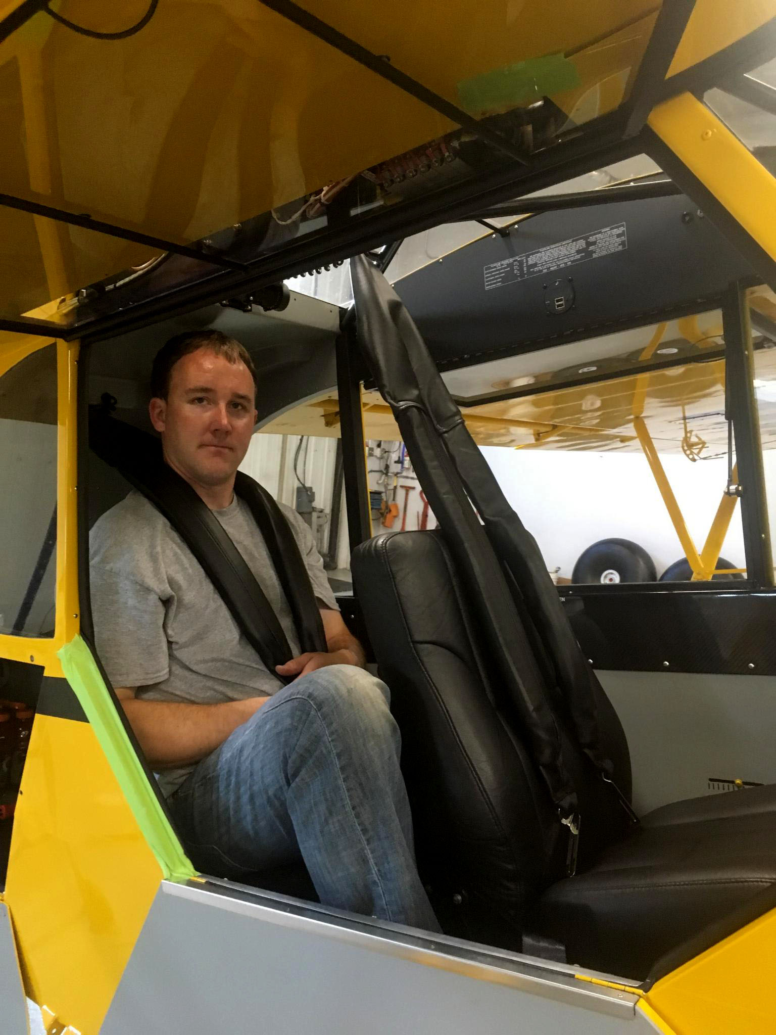 AmSafe airbag seat belts have been installed in the AOPA Sweepstakes Super Cub. The airbags deploy away from the occupant for an increased level of safety. Photo by Roger Meggers.