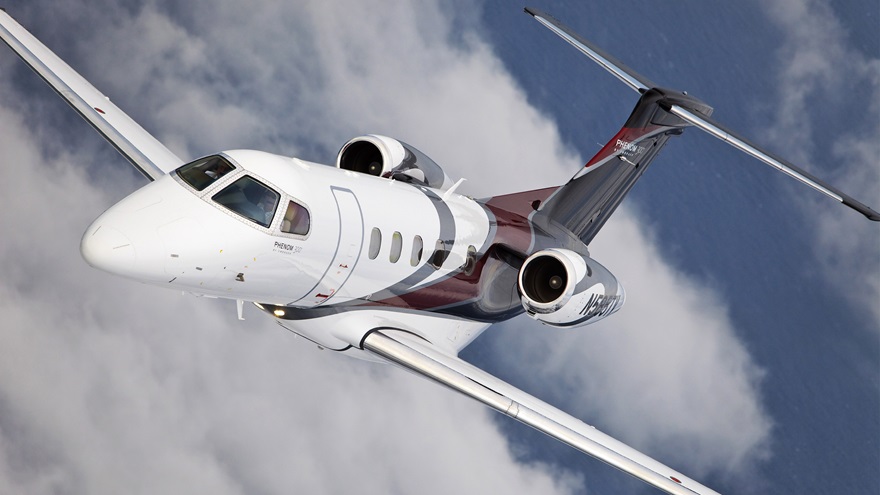 Embraer Phenom 300. Photo by Mike Fizer.