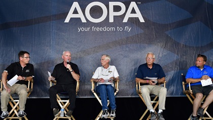 AOPA Editor in Chief Tom Haines, AOPA President Mark Baker, AOPA General Counsel Ken Mead, former head of the Minneapolis-St. Paul Metropolitan Airports Commission and AOPA Airport Access Advisory Panel member Jeff Hamiel; and pilot and Vice President and General Manager of First Wing Jet Center at Indianapolis Executive Airport Sean White participate in a panel discussion on FBO fees and airport accessibility during EAA AirVenture in Oshkosh, Wisconsin, July 25, 2018. Photo by David Tulis.