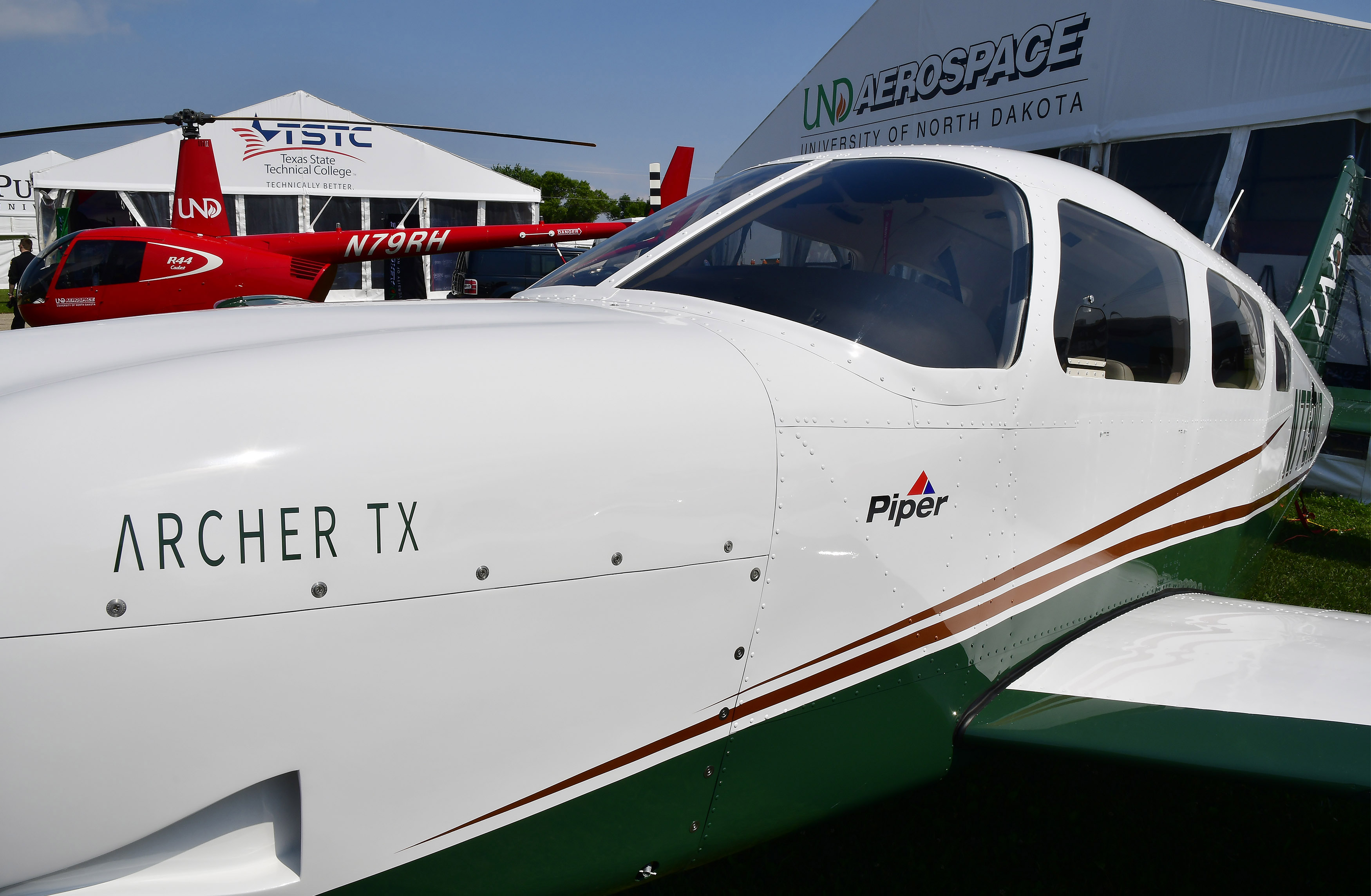 A Piper Archer DX welcomed visitors to the University of North Dakota booth during EAA AirVenture. Photo by David Tulis.