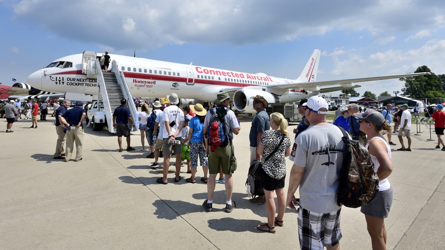 Visitors to EAA AirVenture 2018 wait in line to tour Honeywell's Boeing 757 research test bed. It was the aircraft's first visit to Oshkosh. Photo by Mike Collins.