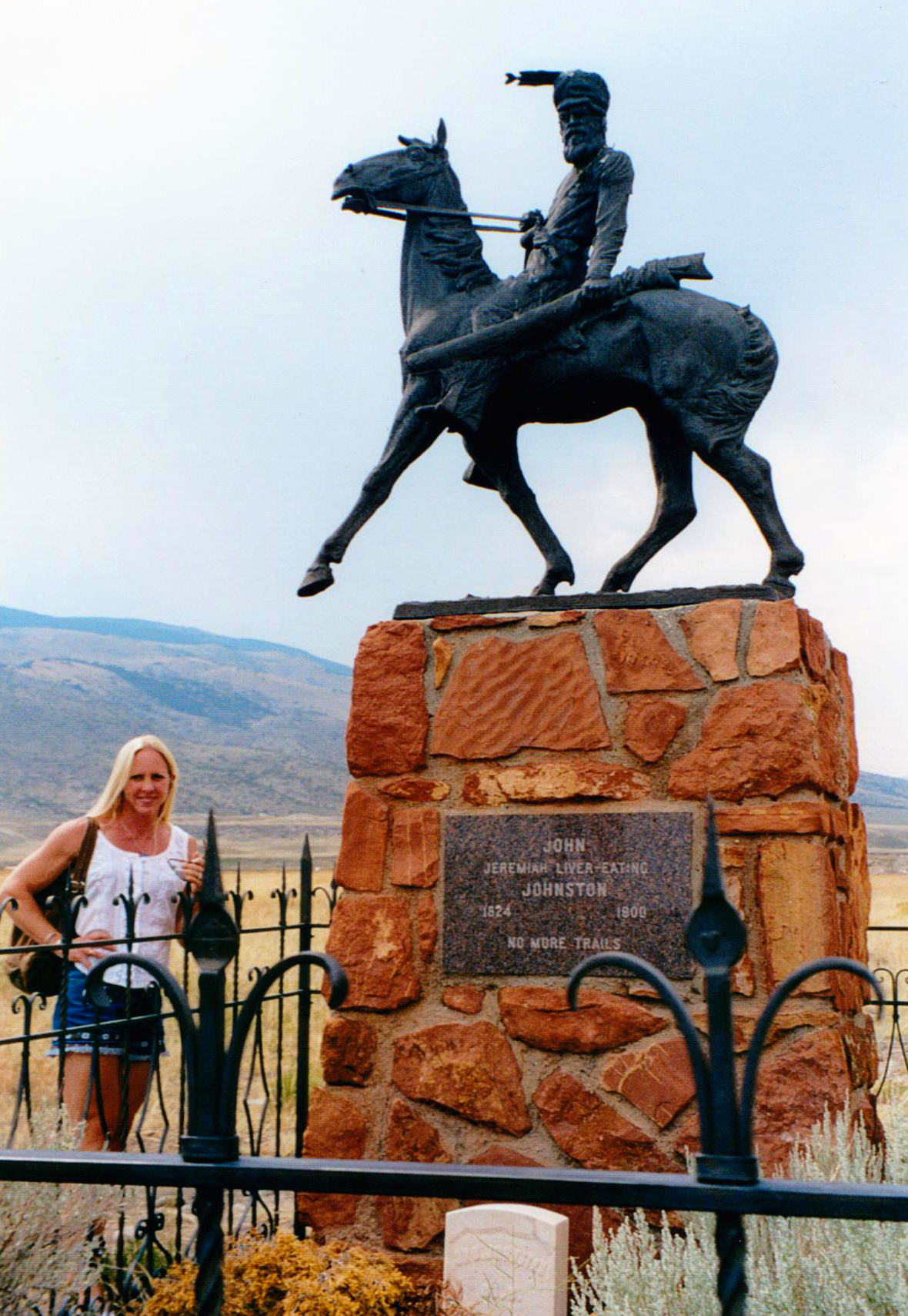 After wandering for years in the mountains of Wyoming and Montana, mountain man John Johnston (portrayed by Robert Redford as “Jeremiah Johnson” in the classic 1972 film) died in a California veteran’s home in 1900. In 1974, when a class of middle-school history students found out he was buried next to a Los Angeles freeway, they were outraged and worked for two years to have him reburied near the mountains he loved. The case escalated to the U.S. Secretary of Veterans Affairs, became national news, and set off a legal battle between Wyoming and Montana over Johnston’s remains, but the kids prevailed in the end. Redford and his son were among some 2,000 people who attended the re-burial at the Mountain Man Cemetery in Old Trail Town, Cody, Wyoming. Photo by Fred Worthy.