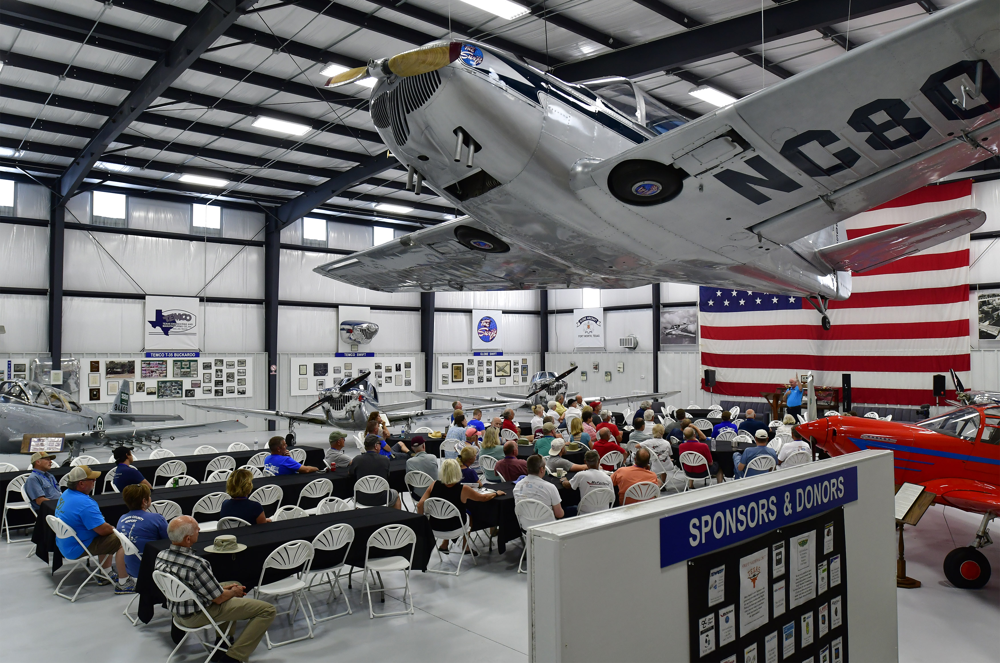 The third Swift aircraft built provides a dramatic backdrop during the 2018 Swift National fly-in to the Swift Museum Foundation June 7 to 10 in Athens, Tennessee. Photo by David Tulis.