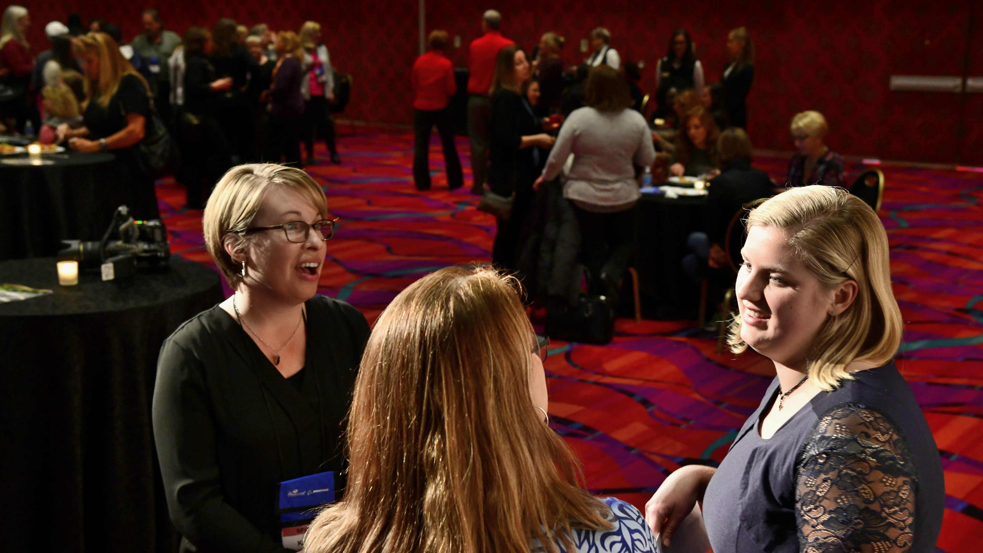 Madelief Schelvis, right, received AOPA's first 2018 fight training scholarship during the 2018 International Women in Aviation Conference. Already in the cross-country phase of her training, she shares her experiences with Kathleen Vasconcelos, left, senior director of development communications for the AOPA Foundation, and Paula Wivell, AOPA’s coordinator of flight operations and dispatch. Photo by Mike Collins.