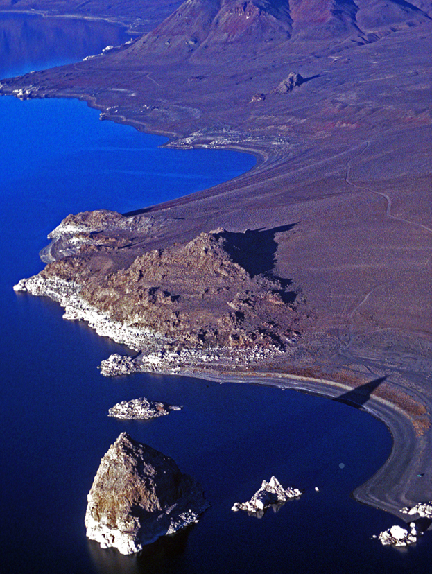 When flying to Sacramento, arrivals from the northeast can weave through numerous large MOAs and avoid the highest portions of the imposing Sierra Nevada range by overflying Pyramid Lake, north of Reno, and then flying a heading of approximately 230 degrees until west of the mountains. It is not advisable to cross the Sierra Nevada if winds at 12,000 feet exceed 20 to 25 knots, because they can generate severe mountain wave action, downdrafts, and rotors on the lee side. At least that’s my rule, after surviving all the above plus extreme turbulence once, near Mount Whitney. Photo by Day Williams.