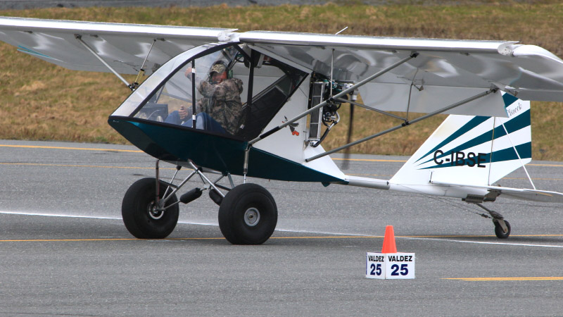 Dan Reynolds of Dawson City, Yukon, Canada, pumps his fist after setting a new Valdez Fly-In landing record of 9.5 feet in his Birdman Chinook. He took second place in the overall competition on May 12. Photo courtesy of Joe Prax and the Valdez Fly-In.