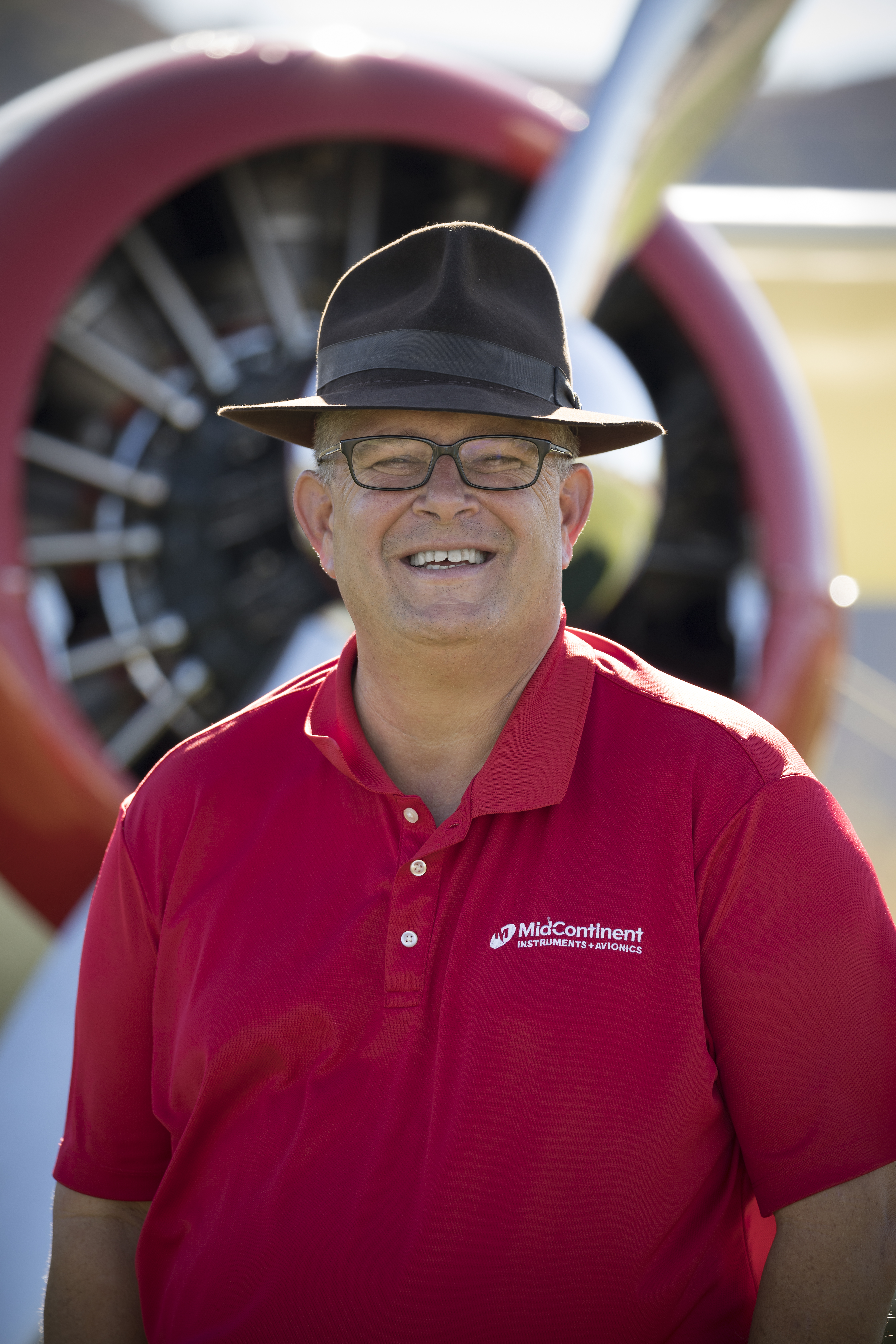Pilot Pat Napolitano with Beech Staggerwing flown by Mid-Continent. Photo by Chad Slattery.