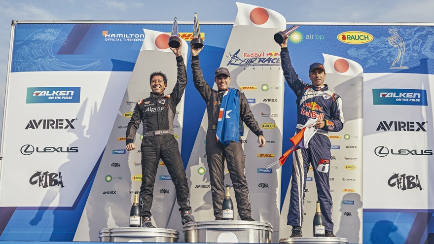 Matt Hall (AUS) (C) celebrates with Michael Goulian of the United States (L) and Martin Sonka of the Czech Republic (R) during the Award Ceremony at the third round of the Red Bull Air Race World Championship in Chiba, Japan on May 27, 2018. // Balazs Gardi/Red Bull Content Pool