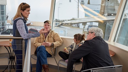 AOPA Airport Support Network volunteer Dee Hanson, who is also the former executive director of the Alaska Airmen Association and founder of the Great Alaska Aviation Gathering, talks with AOPA Alaska Regional Representative Tom George. Photo by Mike Fizer.