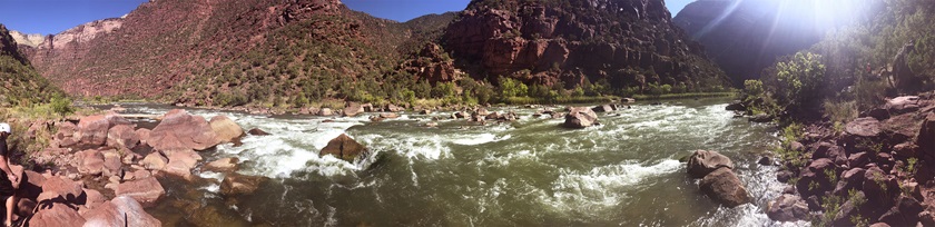 Red walled canyons frame whitewater rapids in the Gates of Lodore section of the Green River near Vernal, Utah. Photo by David Tulis.