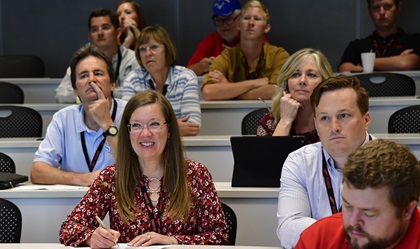 SkyTrek Alaska founder Jamie Patterson-Simes takes notes during a Redbird Migration customer service presentation at the AOPA You Can Fly Academy in Frederick, Maryland, Oct. 10, 2018. She earned the 2017 AOPA Flight Training Experience Award for best flight school. Photo by David Tulis.