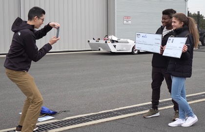 Students show off some of the almost $400,000 in scholarships distributed during the thirteenth annual Aviation Education and Career Expo in Leesburg, Virginia. Photo by Josh Cochran.