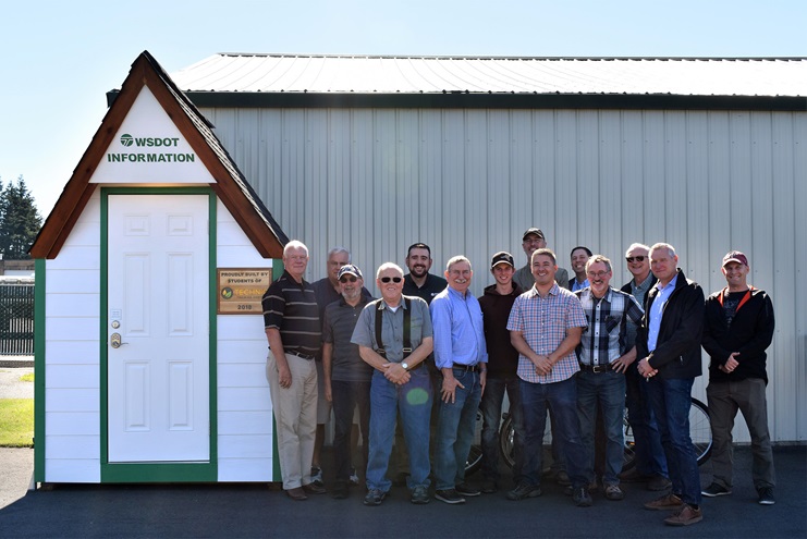 A group of students from the Lynden Door Technic Training Center in Washington constructed a small, freestanding, enclosed informational kiosk at the Lynden Airport that points pilots to local highlights. Photo courtesy of Christina Crea, WSDOT.