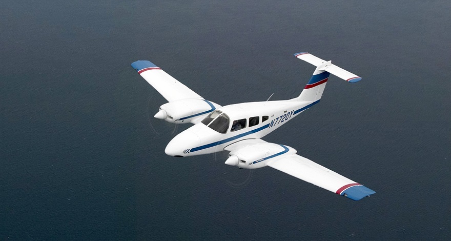 A Piper Seminole Twin in flight. Photo by Mike Fizer.