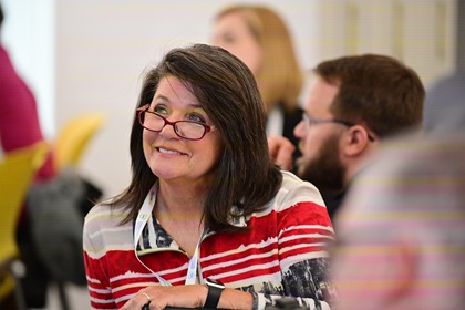 High school educator Carla Ladner of Lufkin, Texas, participates in a hands-on ninth grade curriculum rocket launching workshop during a training session April 26. Photo by David Tulis.