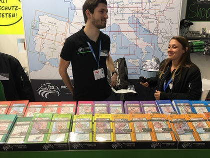 Among the items available for purchase in the exhibit hall are European navigation charts. Photo by Tom Horne.