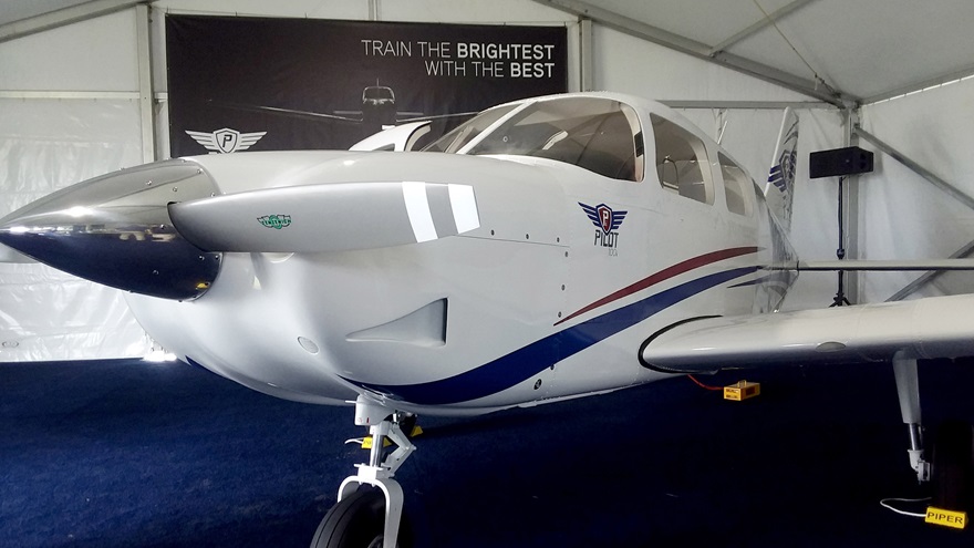  Piper Aircraft introduced the two-seat VFR-equipped 100 and three-seat instrument-equipped 100i models during an April 2 news conference at Sun 'n Fun. The trimmed down, lower-cost variants of the PA-28 Archer TX are aimed at flight schools and university aviation programs and are priced at $259,000 and $285,000, respectively. Photo by Alyssa Cobb.
