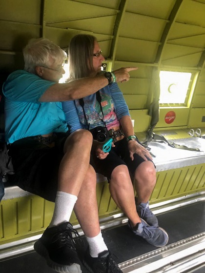Gus Hawkins with his wife Pat aboard "That's All Brother." Hawkins's father was a paratrooper during World War II, and the family has made several donations to restore the aircraft. Photo by Jennifer Non.