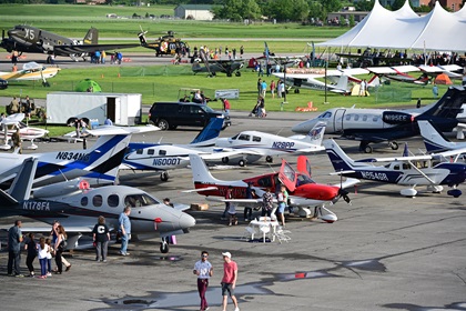Aviation enthusiasts attend the Flightline Cookout during the AOPA Frederick Fly-In and eightieth anniversary celebration at Frederick Municipal Airport, Friday, May 10, 2019. Photo by David Tulis.