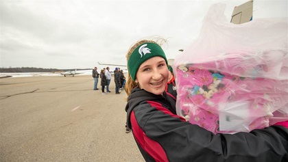 Volunteers deliver gifts to Roben-Hood Airport during Operation Good Cheer. Photo by Mike Fizer.