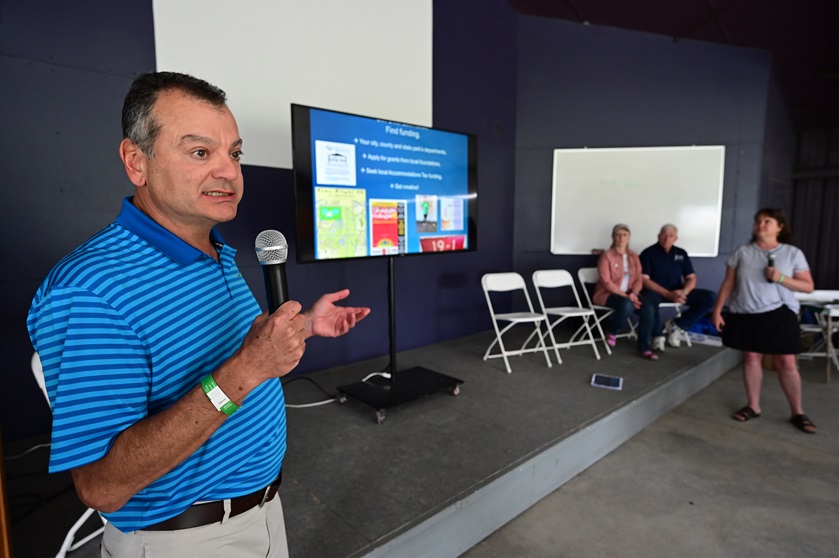 Greenville Downtown Airport director Joe Frasher and Lara Kaufmann, right, helped establish an aviation-themed playground at the South Carolina airfield. Photo by David Tulis.