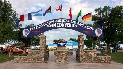 In 2019, aviators were welcomed to EAA AirVenture from the runway side by a special blue painted arch (typically brown) to commemorate the fiftieth consecutive fly-in at Oshkosh. EAA has canceled AirVenture 2020 because of the coronavirus pandemic. Photo by Kollin Stagnito.