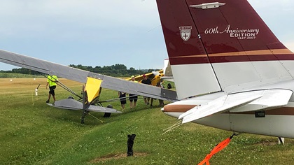 Weekend weather twisted two taildraggers tied down at nearby Appleton International Airport, one of the reliever airfields during EAA AirVenture. One aircraft was lifted and deposited in a drainage ditch and another was relocated several spots by a violent thunderstorm. Photo courtesy of Jolie Lucas.